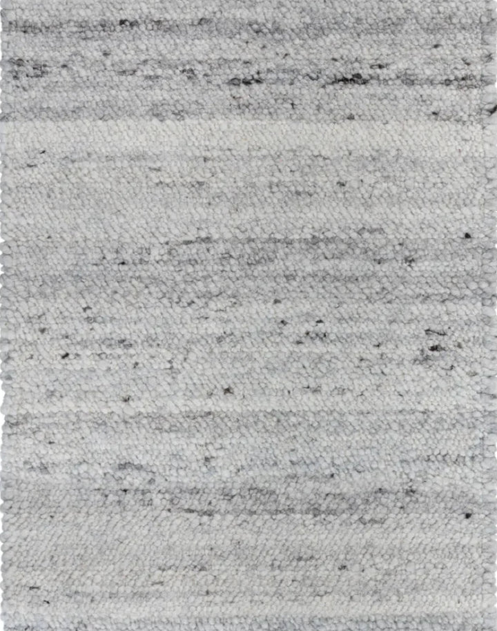 A rectangular area rug with a textured, woven horizontal striped pattern in shades of light gray, off-white, and charcoal.