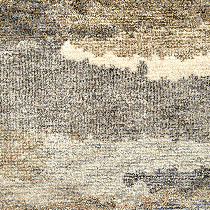 Close-up of a textured rug with neutral colors