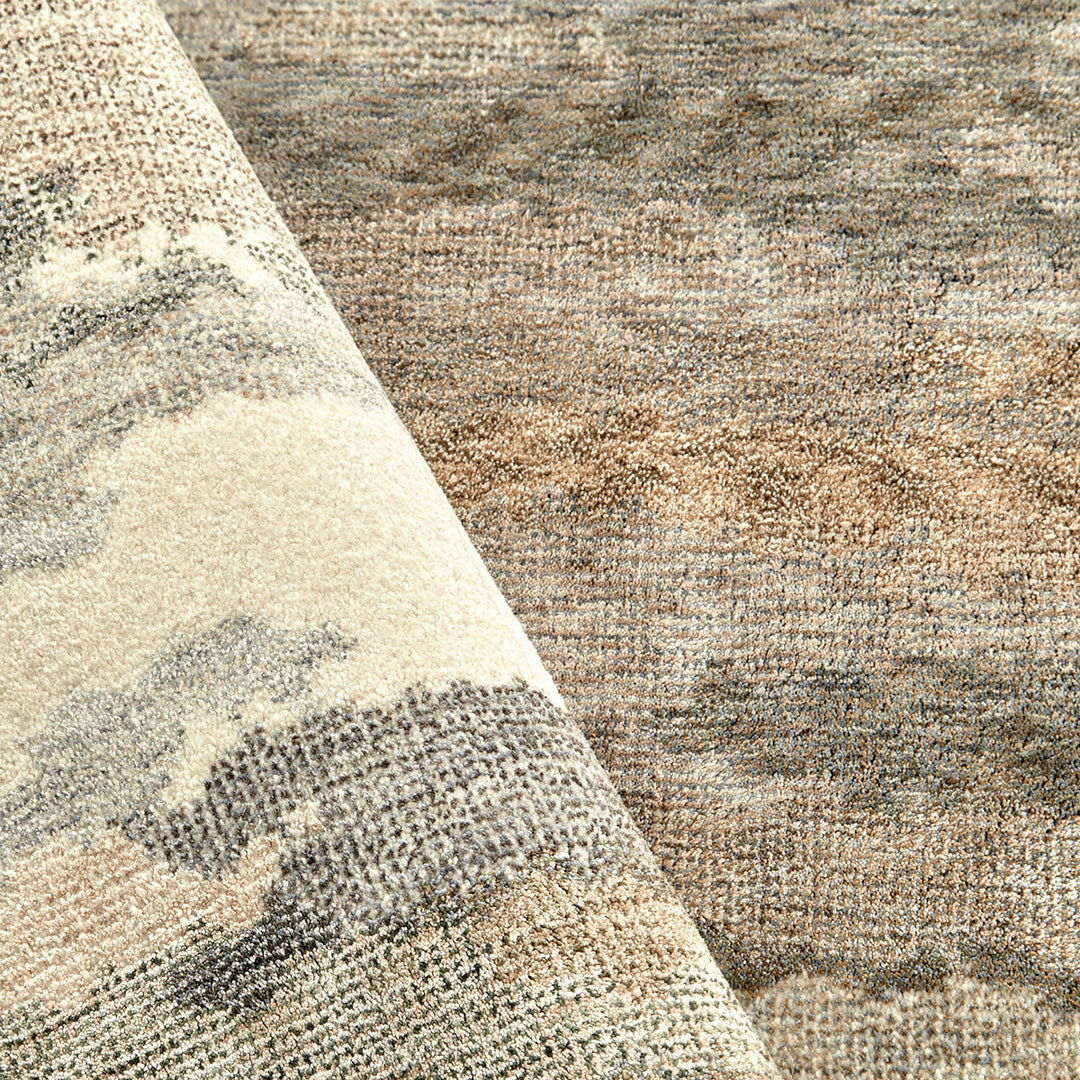 Close-up of a textured fabric with earthy tones rug