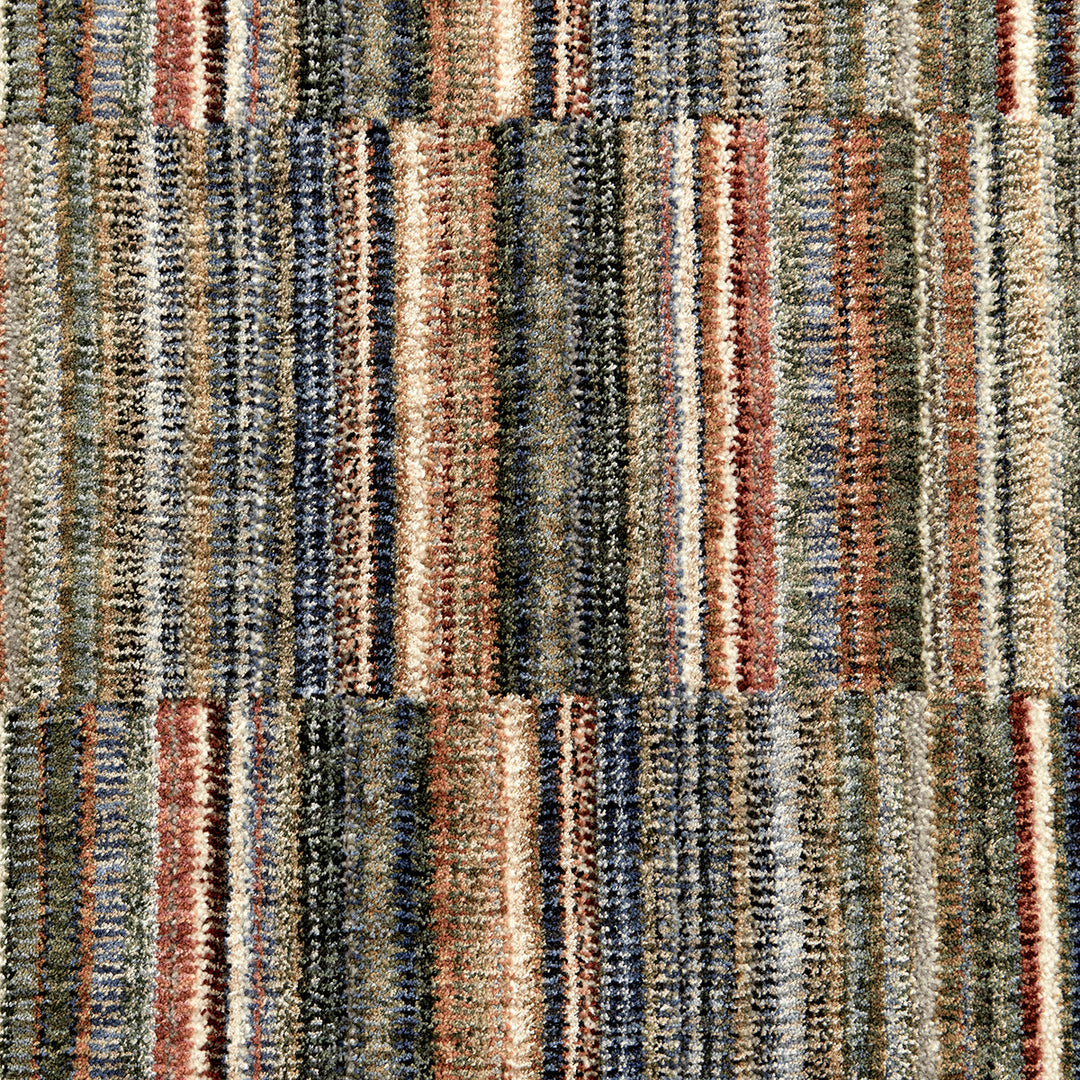 close up of a cut pile extra large multi colour stripe rug