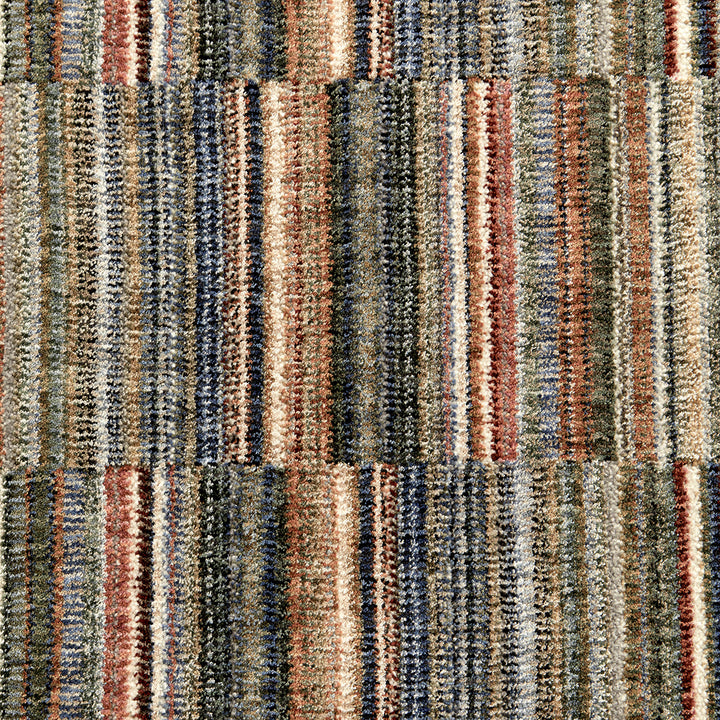 close up of a cut pile extra large multi colour stripe rug