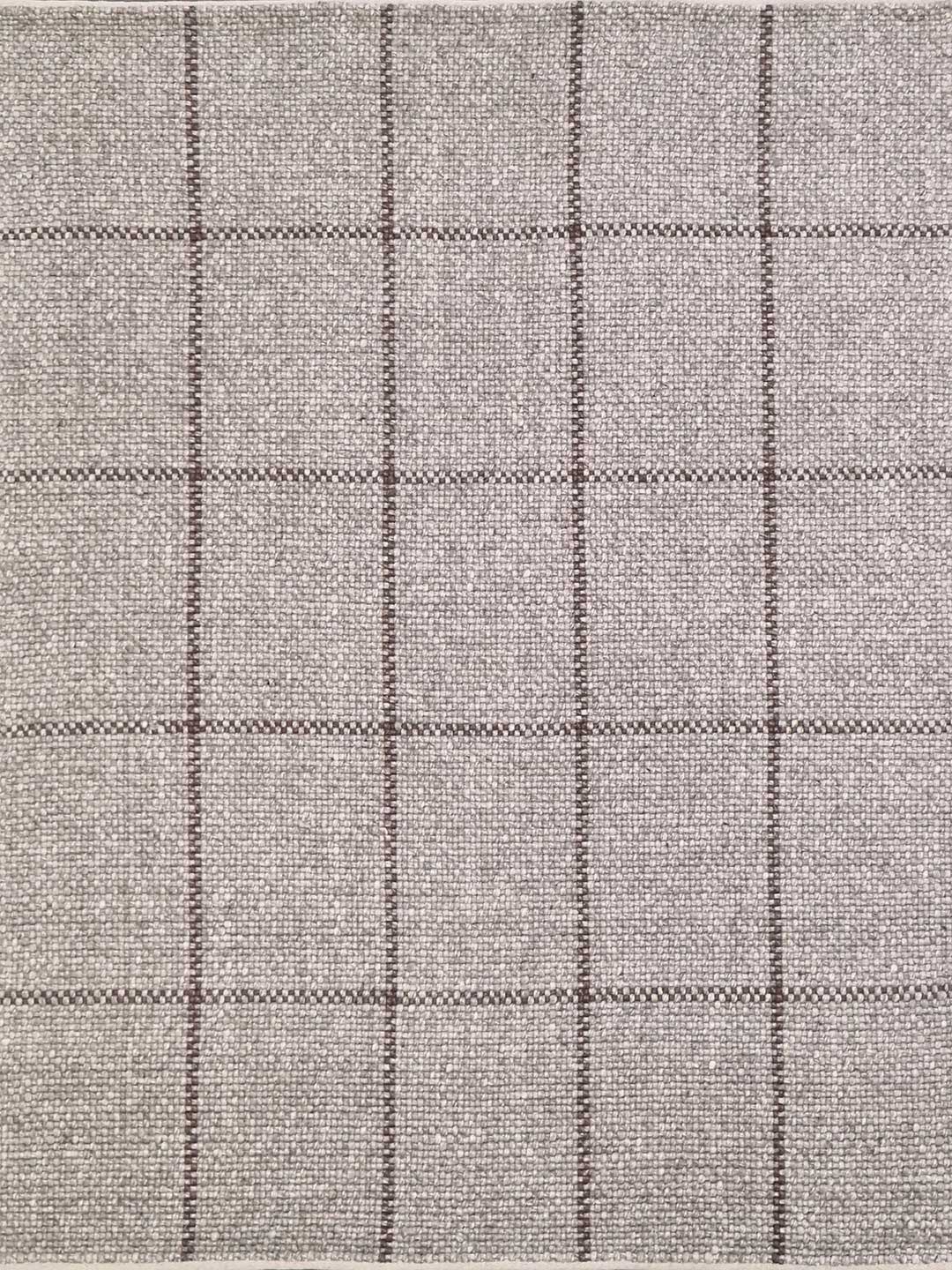 Textured fabric with a subtle check pattern in gray tones