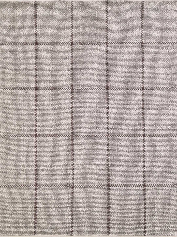 Textured fabric with a subtle check pattern in gray tones