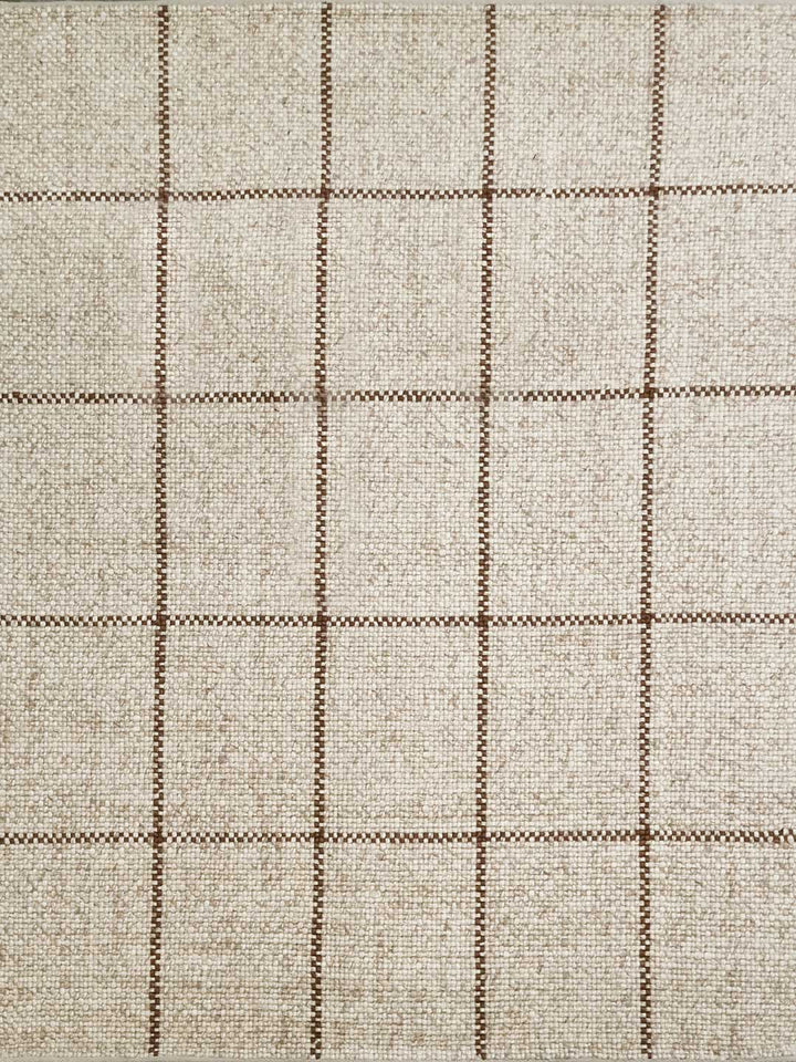 Textured fabric with a checkered pattern in beige and brown tones.