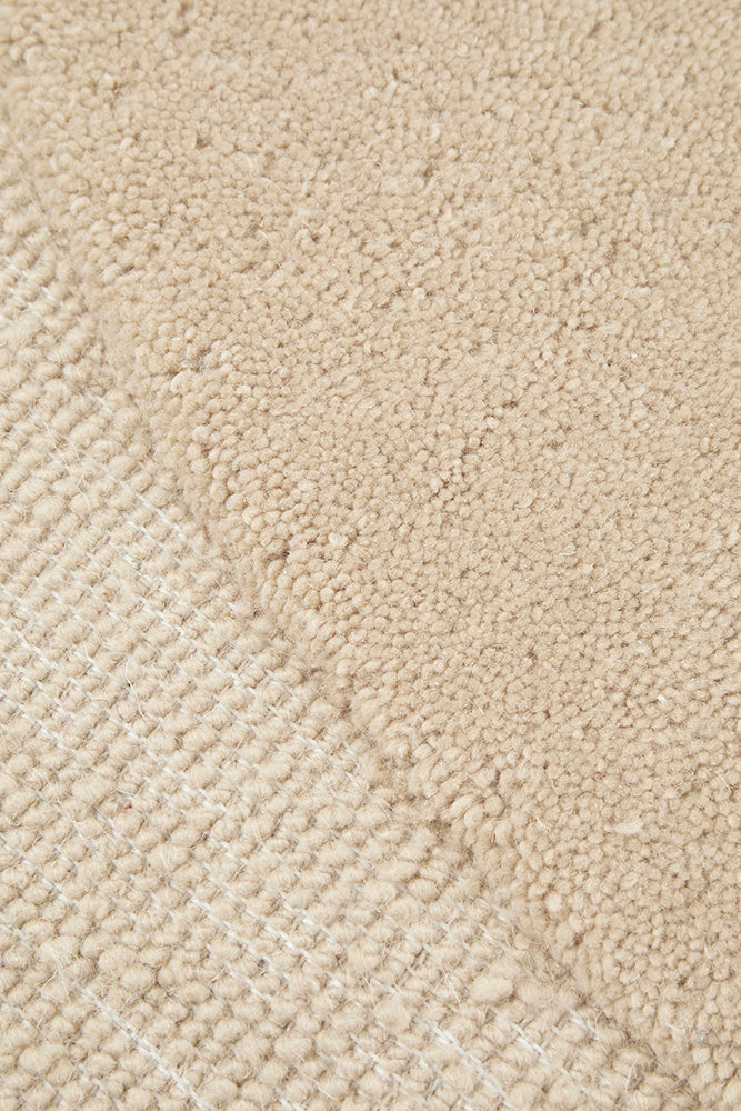 Close-up of beige carpet texture