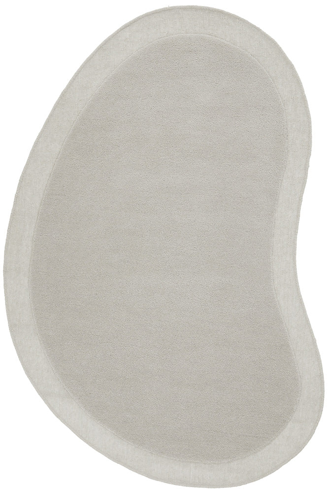 White, oval-shaped cushion on a white background