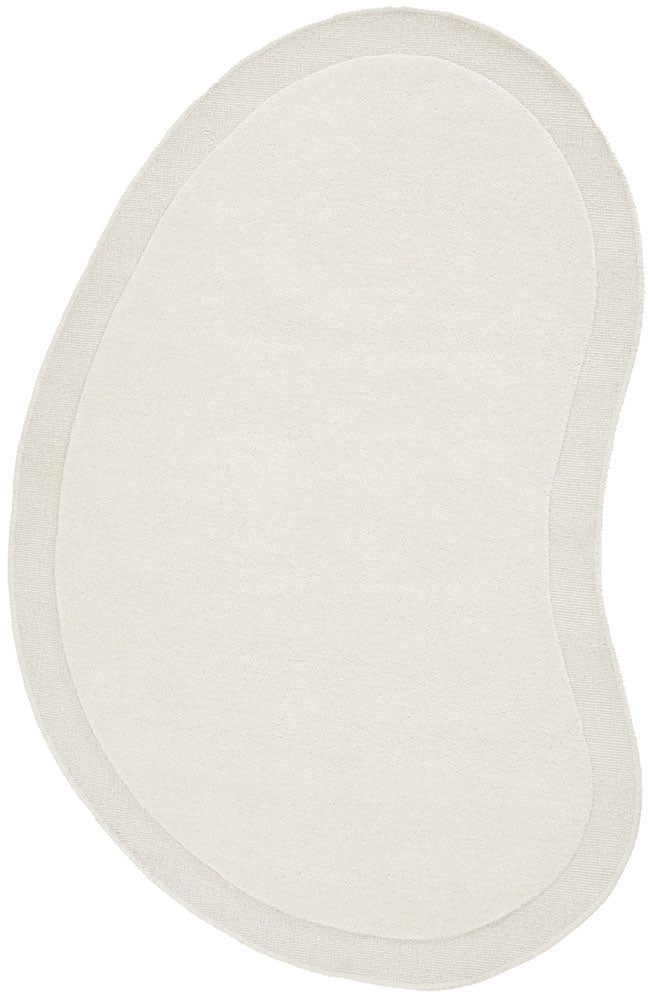 White oval bath mat on a white background