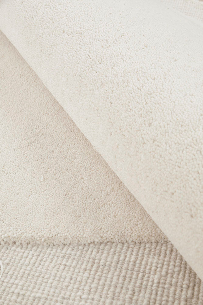 Close-up of beige and white textured fabric