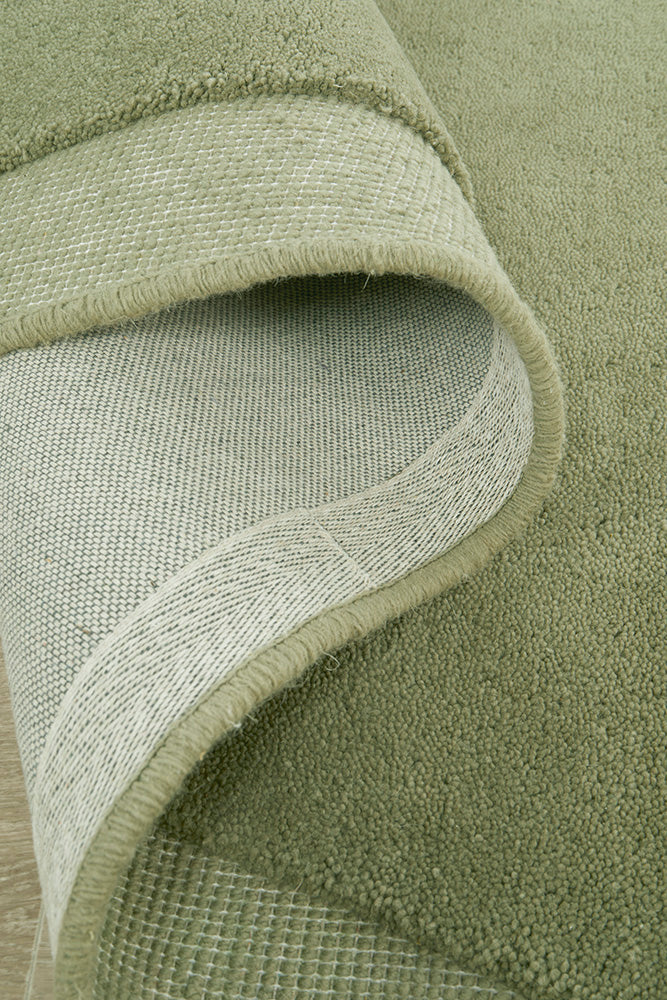 Close-up of a green textured pile with a focus on texture and color.