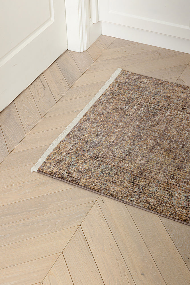 runner close up on a timber herringbone floor fig colour in darren palmer collection