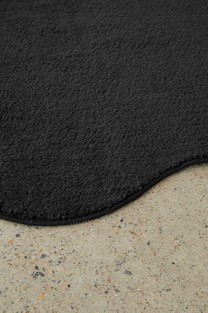 Textured black rug close up