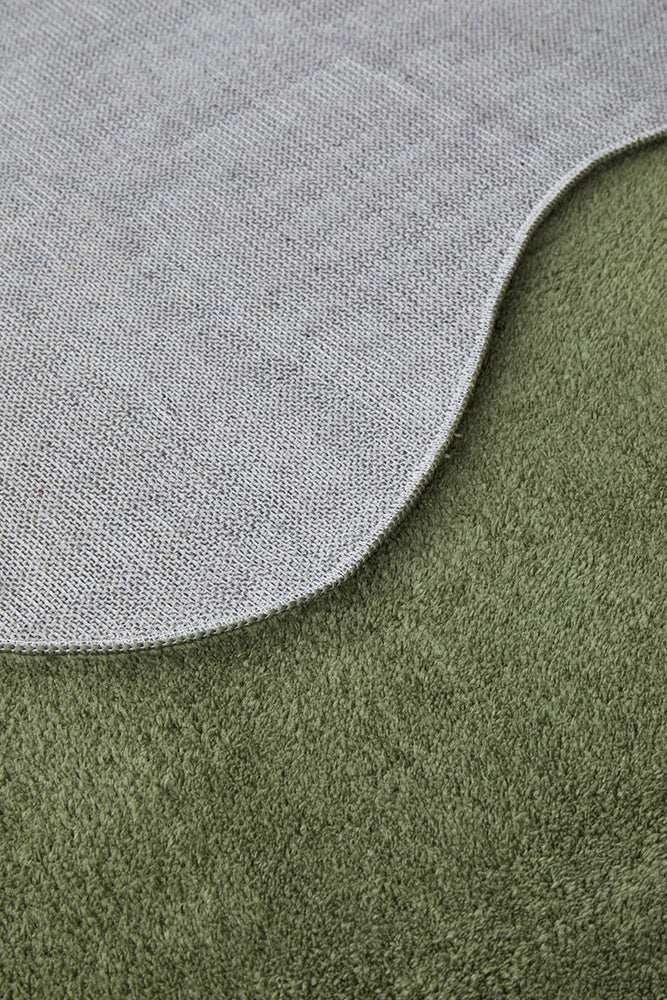 close up of a green pile runner