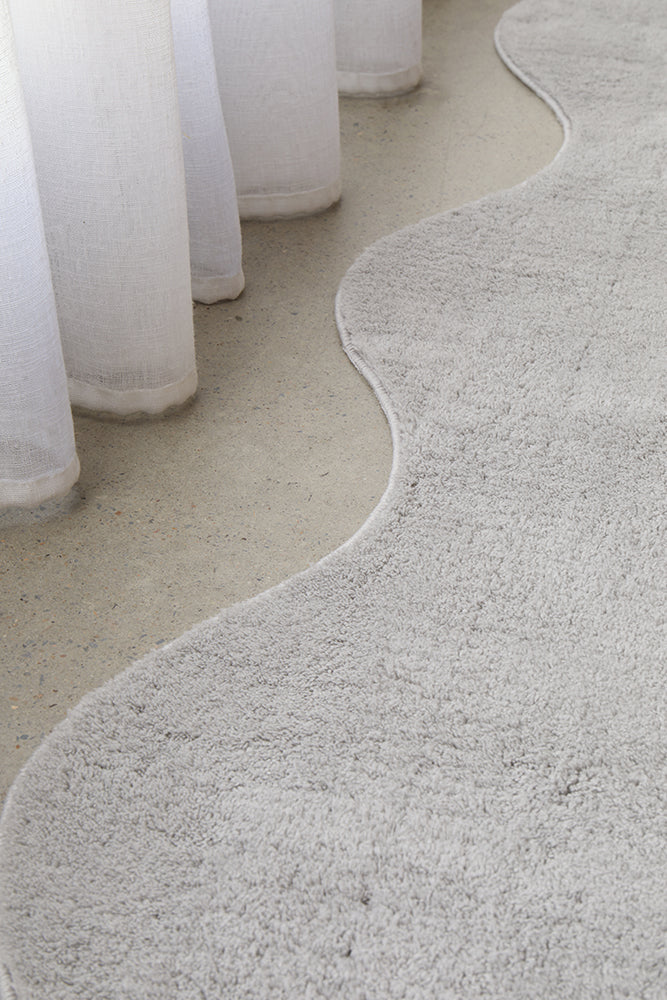 Close up wave edged runner on concrete floor