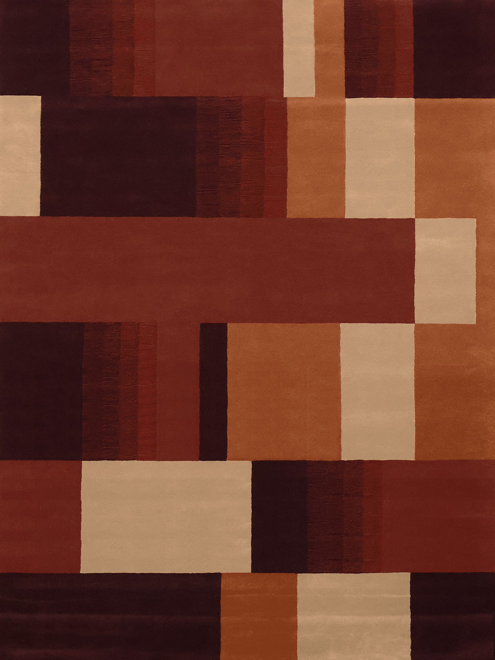 An abstract geometric area rug featuring a modern block pattern in warm earth tones including rust red, terracotta, tan, cream, and dark brown.