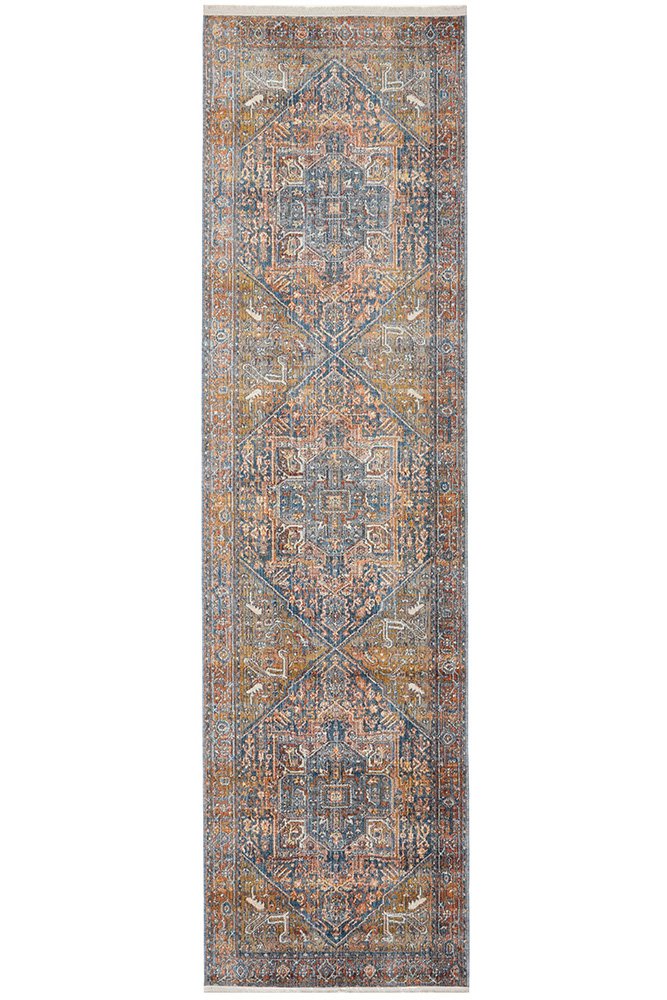 A long rectangular area rug with a distressed traditional pattern in muted blue, beige, and rust tones, shown flat against a white background.