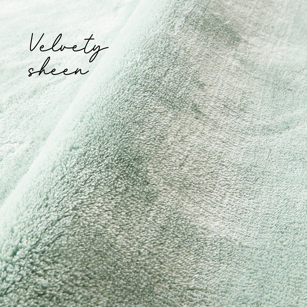 Mint green plush pile rug pile
