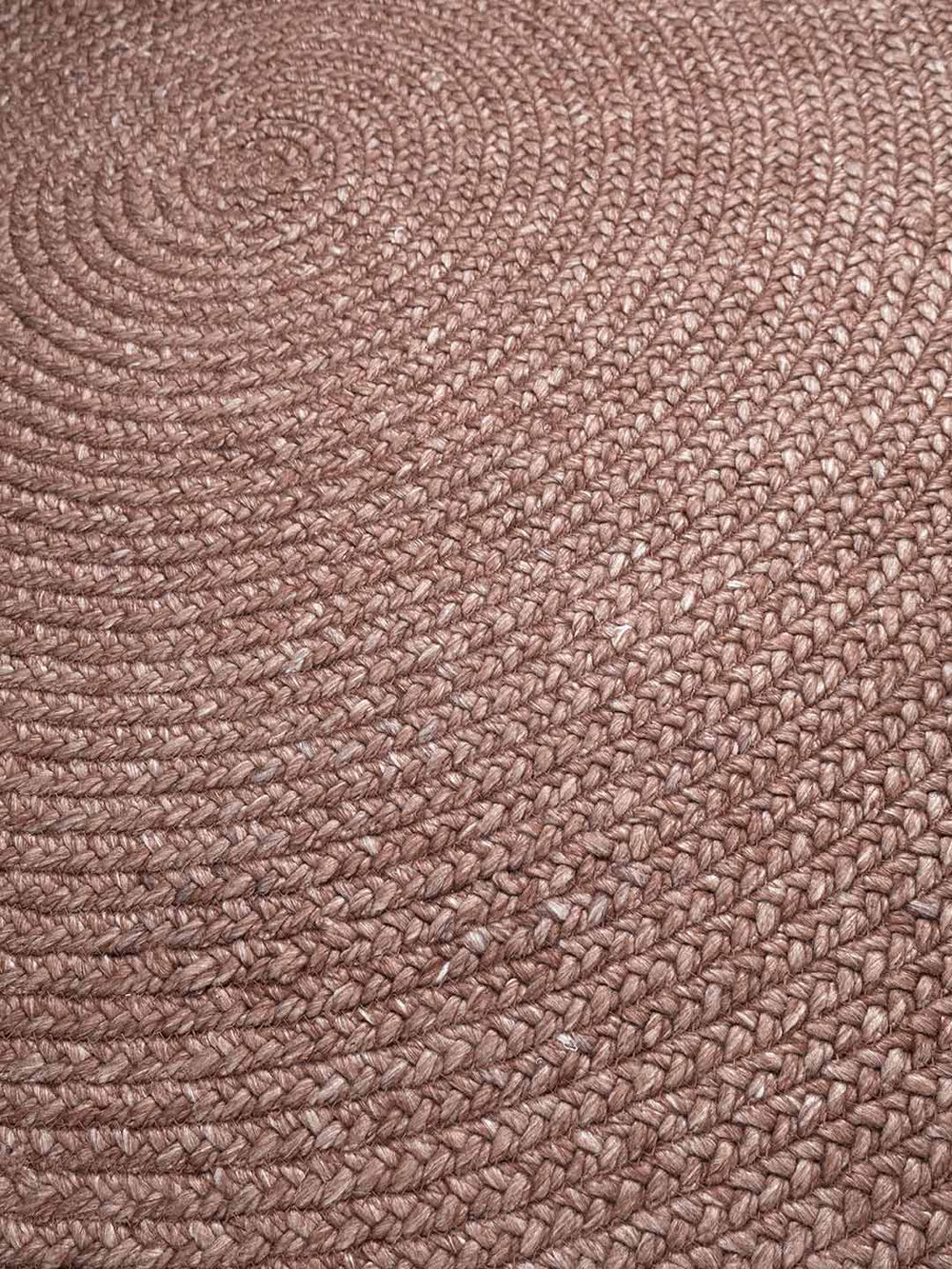 Close-up of a textured berry rug surface