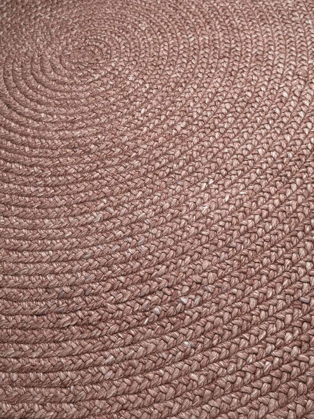 Close-up of a textured berry rug surface