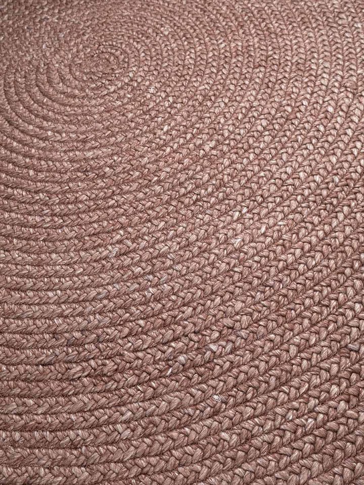 Close-up of a textured berry rug surface