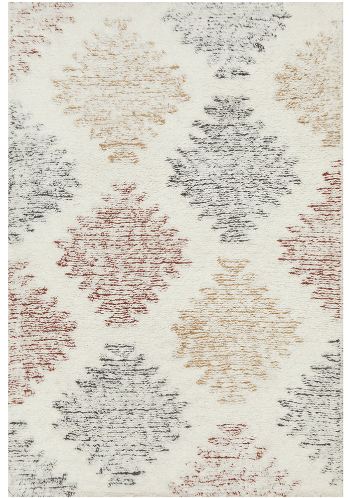 A white based rug with a multi-colored diamond shaped pattern.