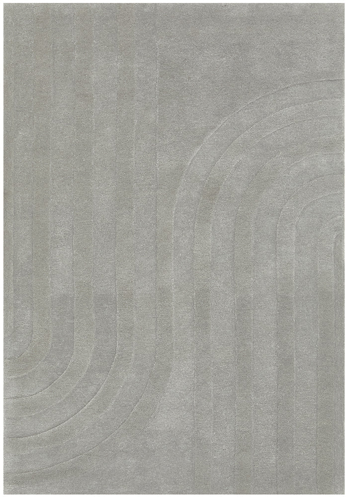 Over head shot of grey rug with swirls pattern.
