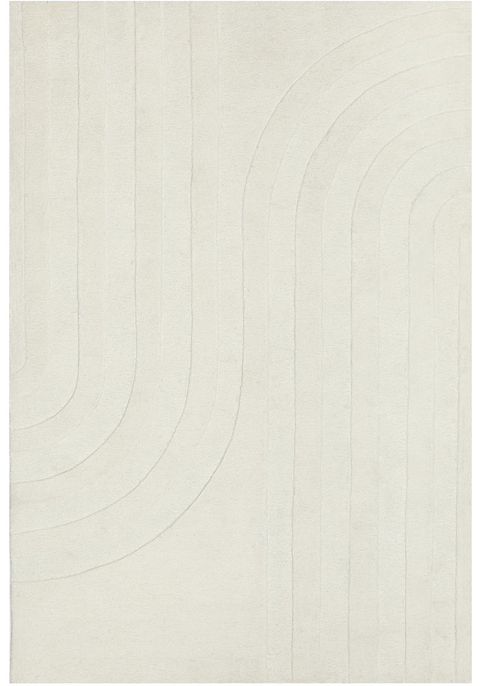 Over head shot of white rug with curve lines.