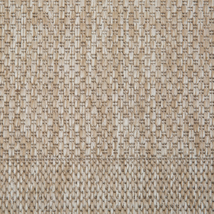 Close-up of a textured beige fabric pattern