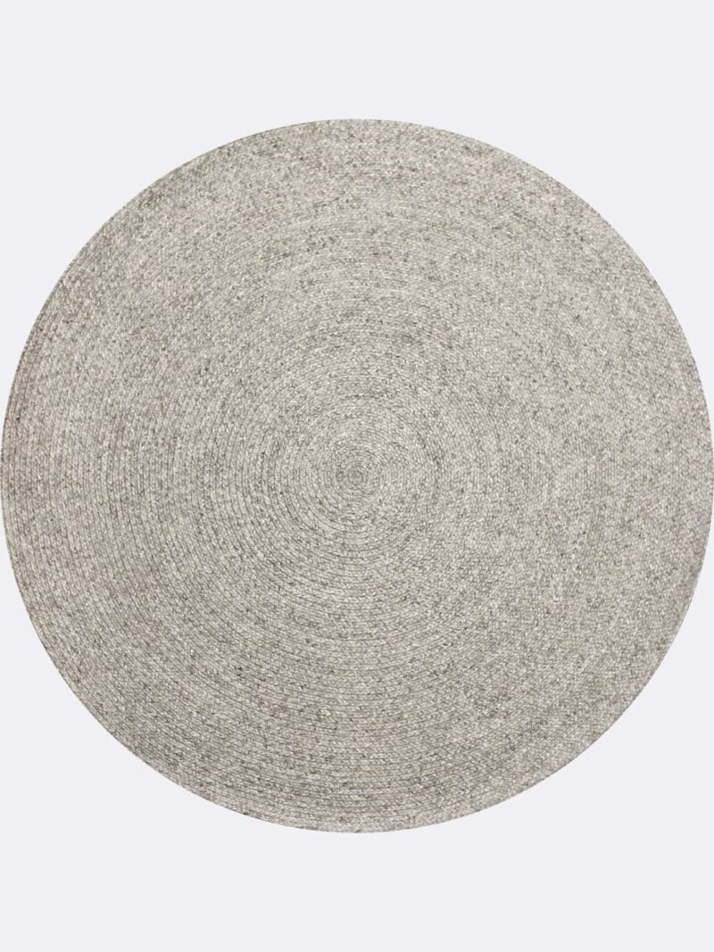 Round gray rug on a white background
