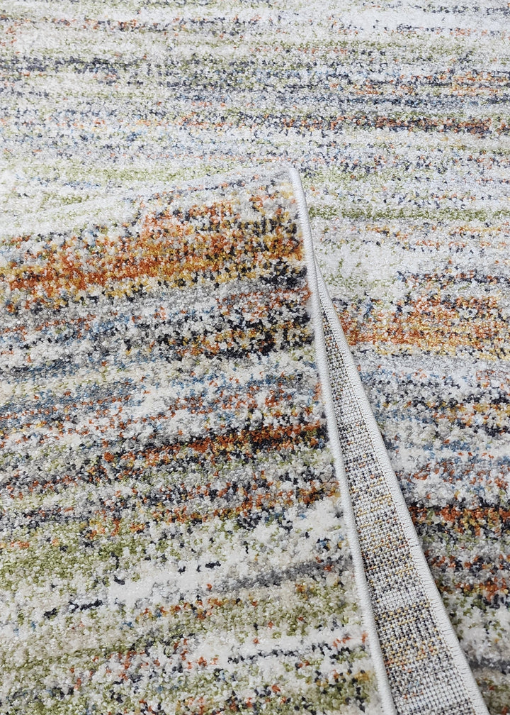 Multicolored striped rug with a close-up view