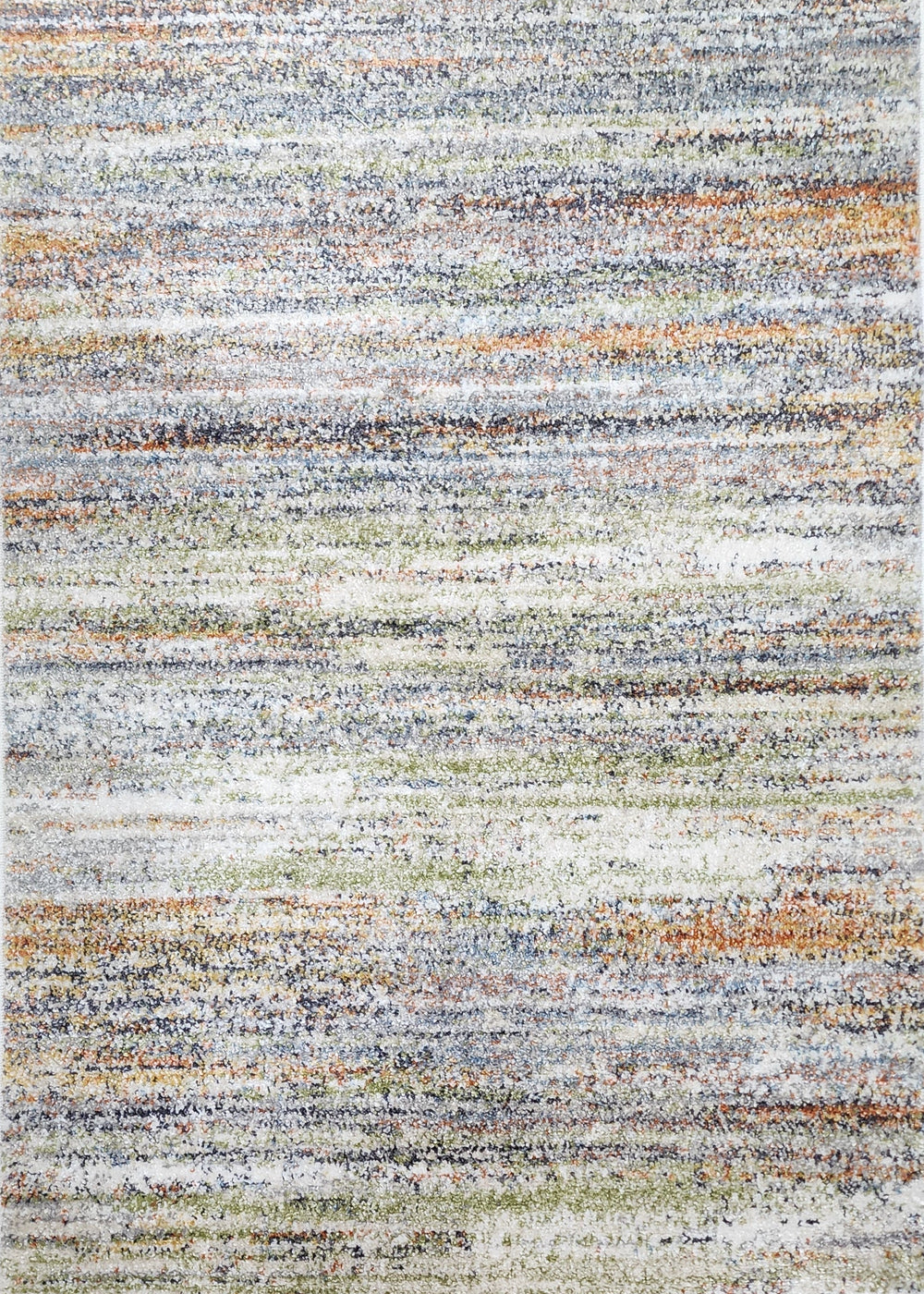 Multicolored textured rug on a wooden floor