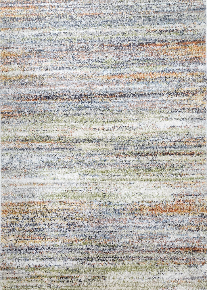 Multicolored textured rug on a wooden floor