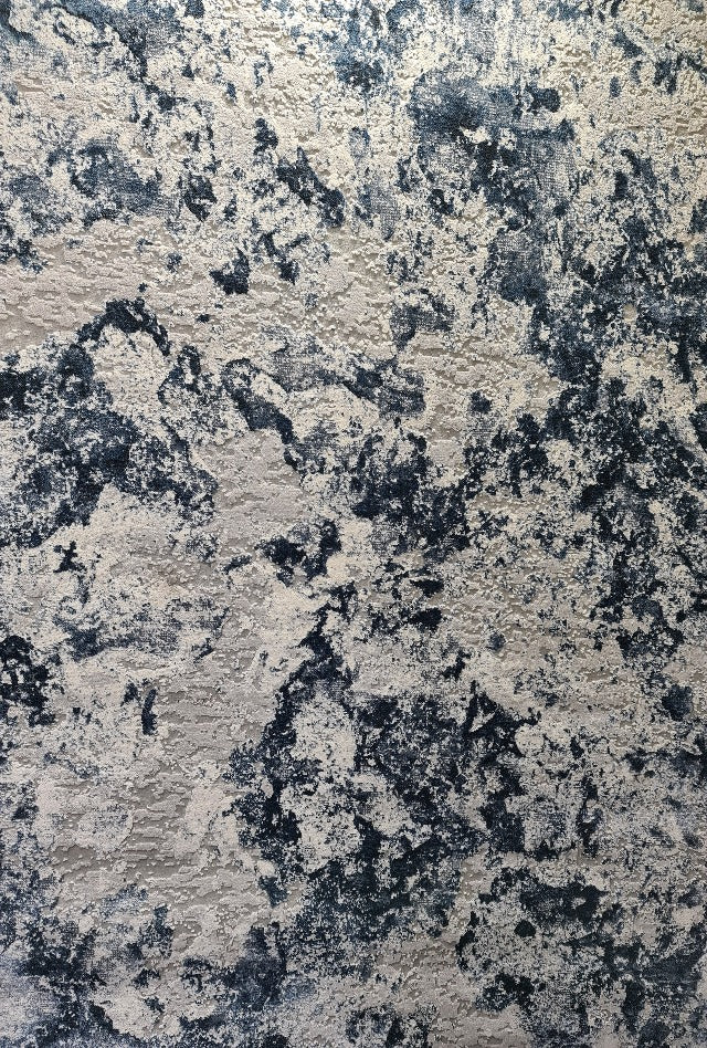 Over head shot of a blue and grey rug