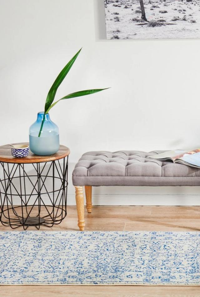 Evoke 258 White Rug with blue and grey highlights. Synthetic Machine Made Rug comes in Extra Large Sizes and Hall Runner