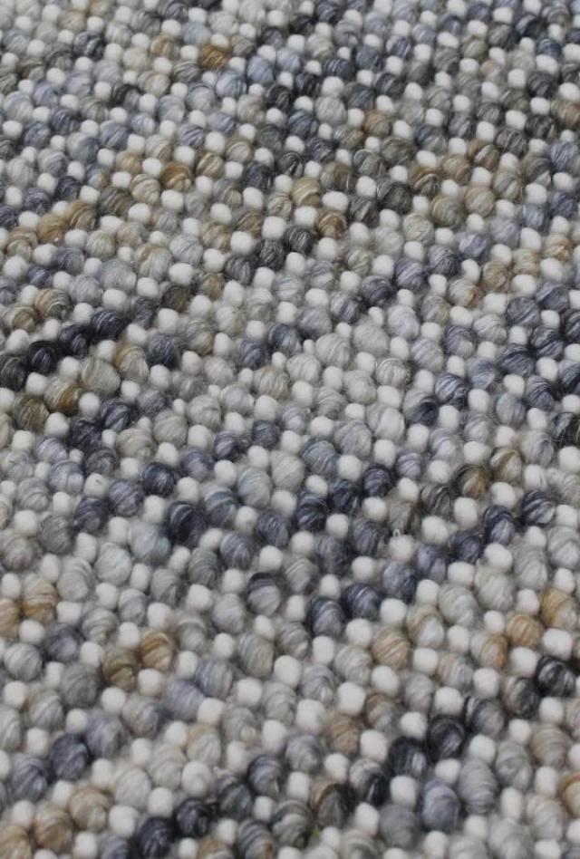 Magic Mineral Wool textured rug with wool loops knotted into a backing. Rug Addiction is a Stockist of The Rug Collection